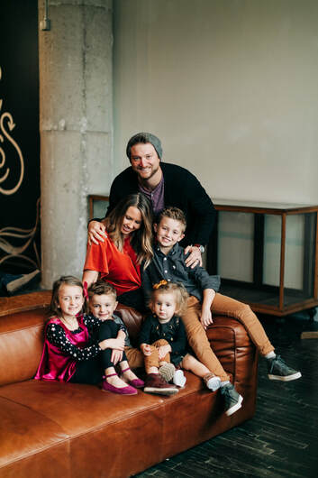 commercial & brand photographer carly laine with her family