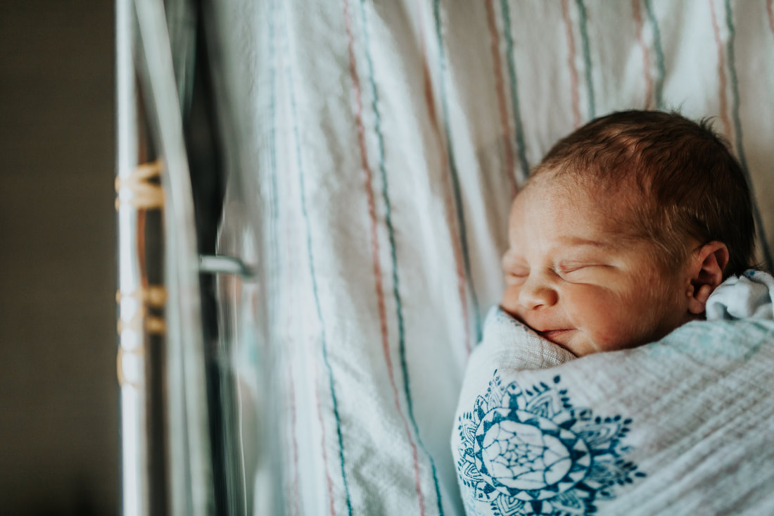 top ten newborn photographers